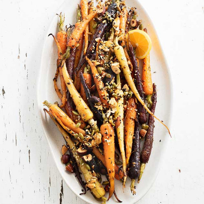 Honey roasted baby carrots with toasted nuts and seeds recipe