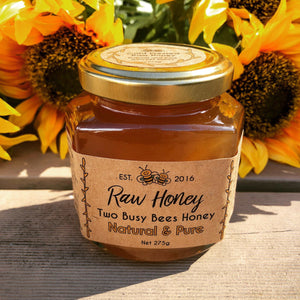 Natural-Pure-honey-in-a-glass-jar-Two-Busy-Bees-Raw-Honey-Outside